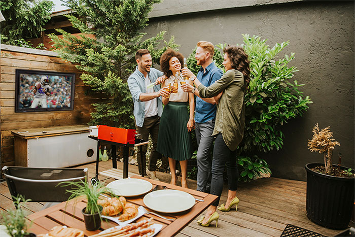 Fall Outdoor TV Enclosure - Fall Party on Backyard Deck