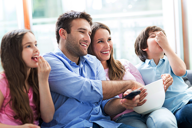 Family watching TV - TV protection Family watching TV - TV protection