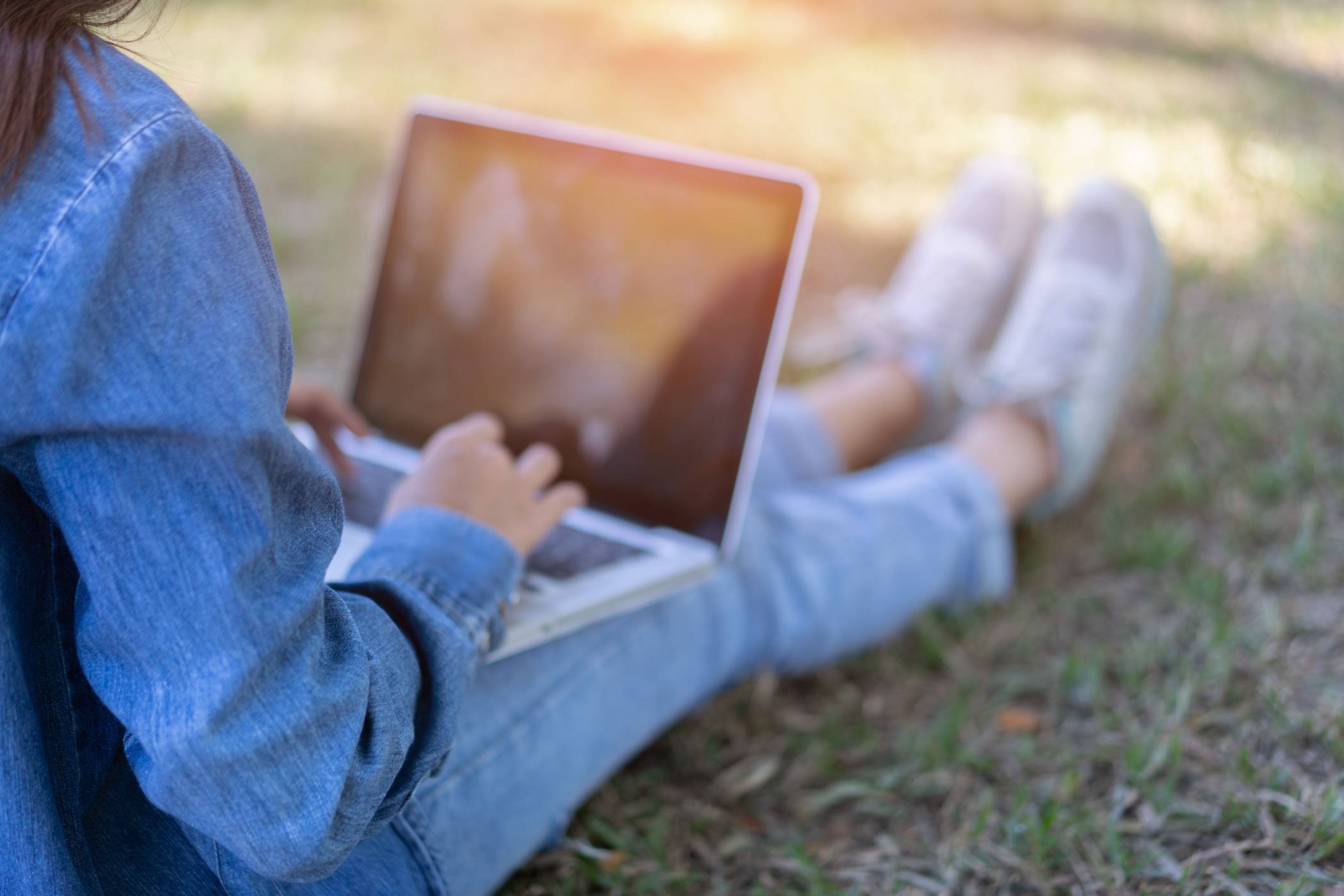 Outdoor Learning Solution - Girl Using Laptop Outside