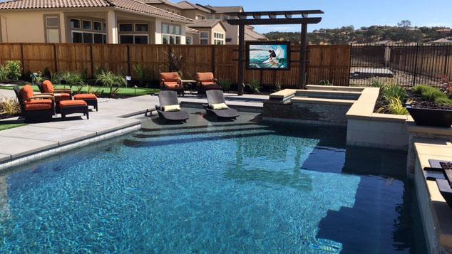 Outdoor home theater by the pool (TV with a The TV Shield PRO outdoor TV enclosure)