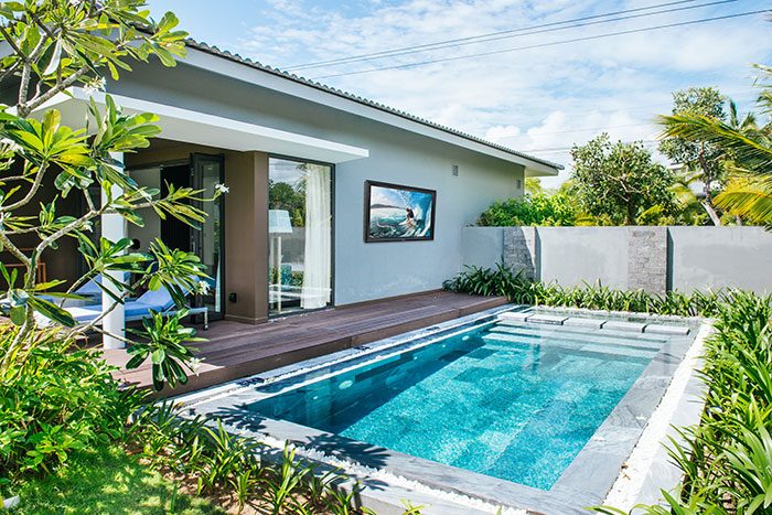 Outdoor TV enclosure installation by pool